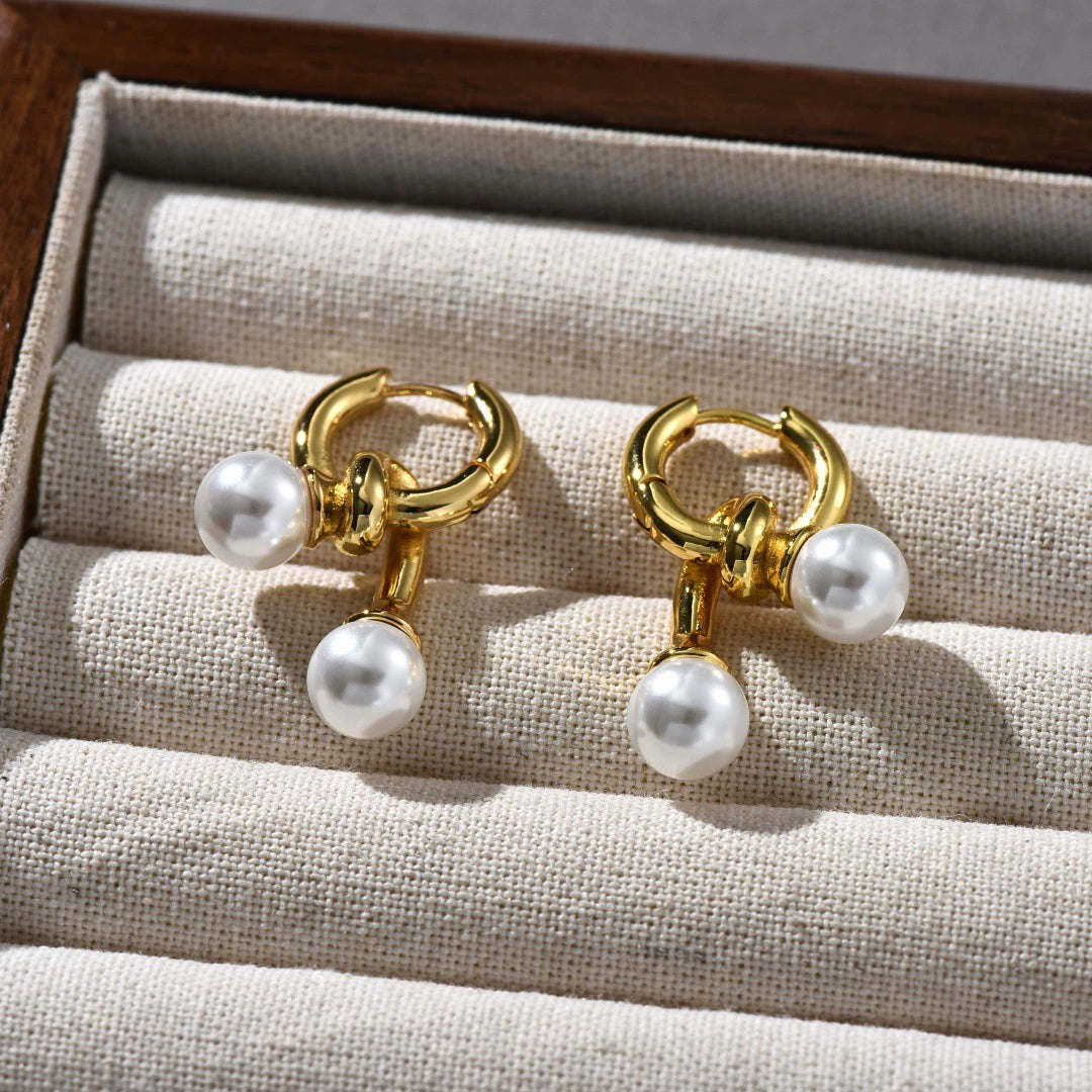 DES PERLES AVEC UNE TOUCHE DE TOUCHE