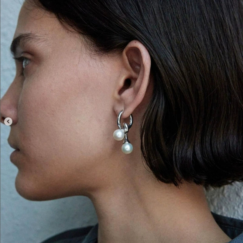 DES PERLES AVEC UNE TOUCHE DE TOUCHE